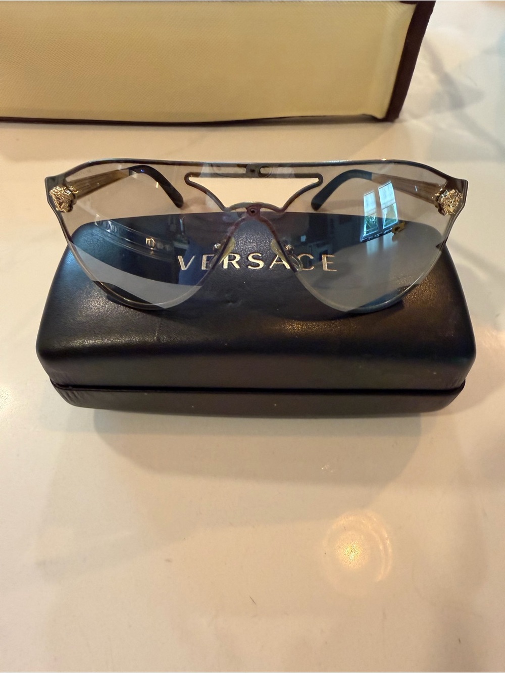 Versace Women’s Gradient Blue Shield Sunglasses with Gold Medusa Accents